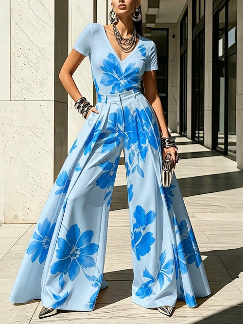 BAGNONE - Completo floreale blu, giallo e rosso a pantaloni ampi