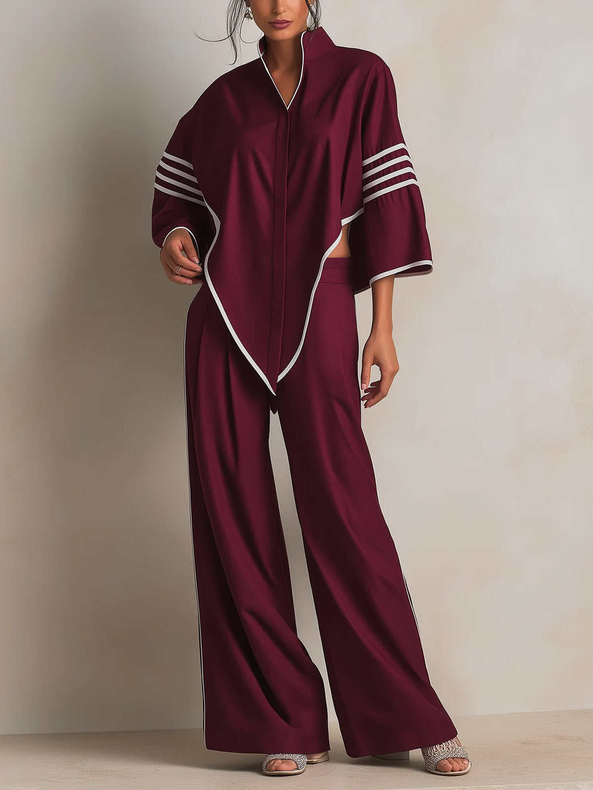 CREMELLA - Completo bordeaux con top asimmetrico e pantaloni ampi
