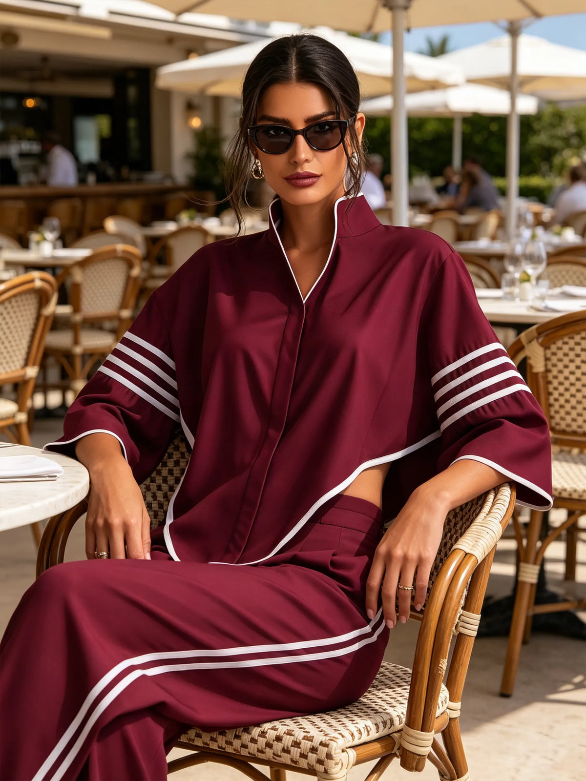 CREMELLA - Completo bordeaux con top asimmetrico e pantaloni ampi