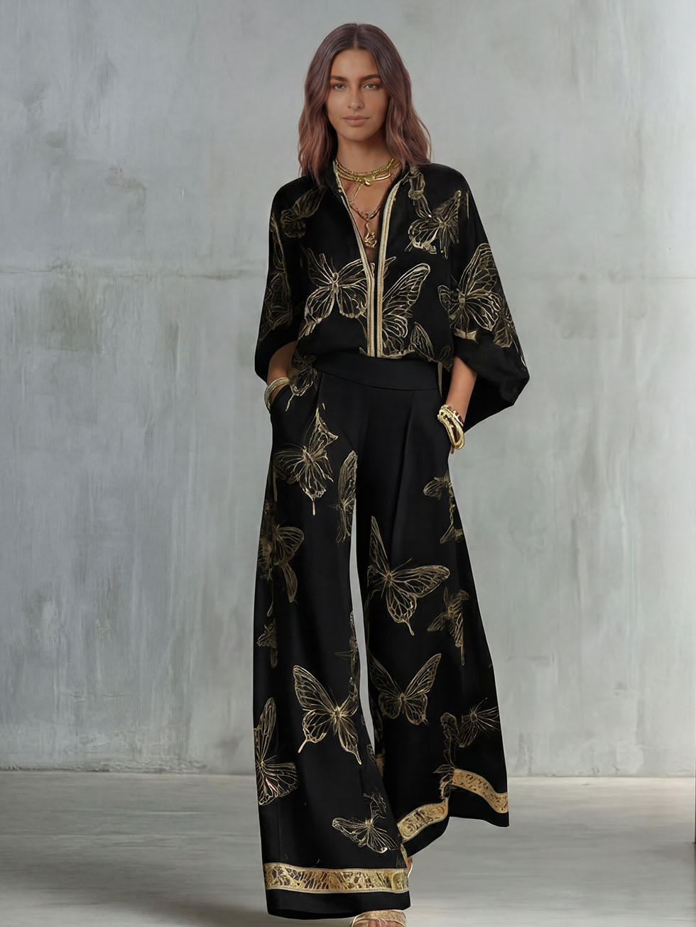 CELIA - Set top zip con farfalle e pantaloni wide leg