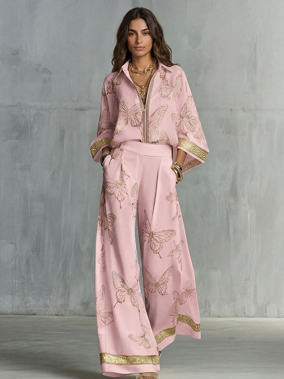 CELIA - Set top zip con farfalle e pantaloni wide leg