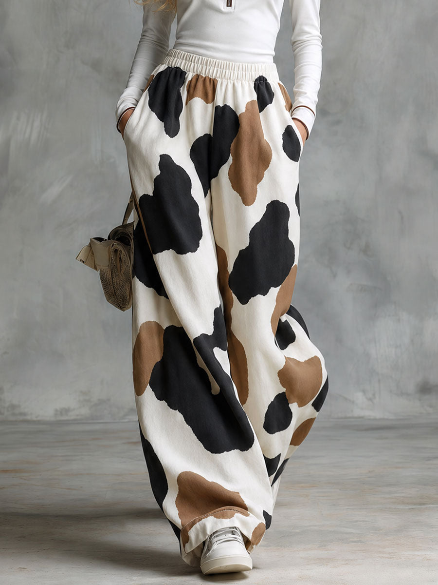 INCUDINE - Set velluto bianco con top half-zip e pantaloni cow print
