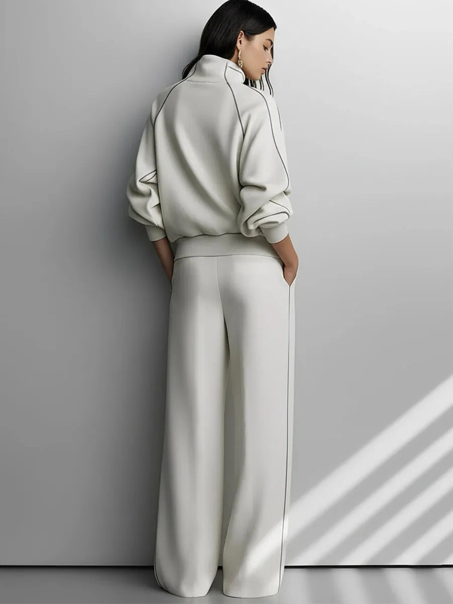 TRECCHINA - Completo beige in maglia con bordi a contrasto e pieghe