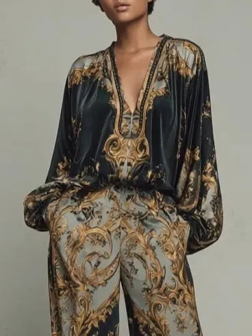FUTANI - Completo nero floreale con top e pantaloni ampi